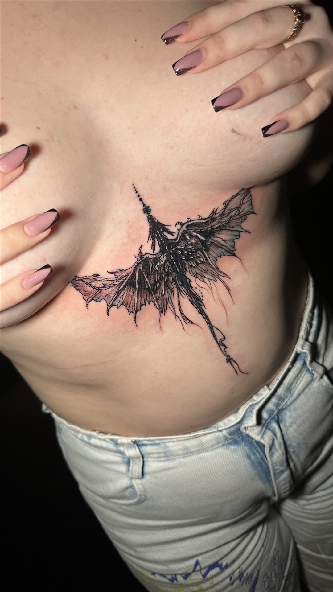 After — dark illustrative dragon sternum cover-up
